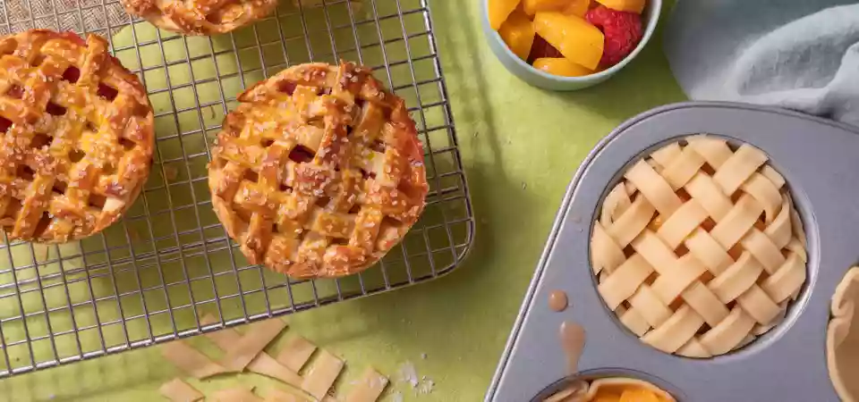 California Cling Peach and Raspberry Mini Lattice Pies